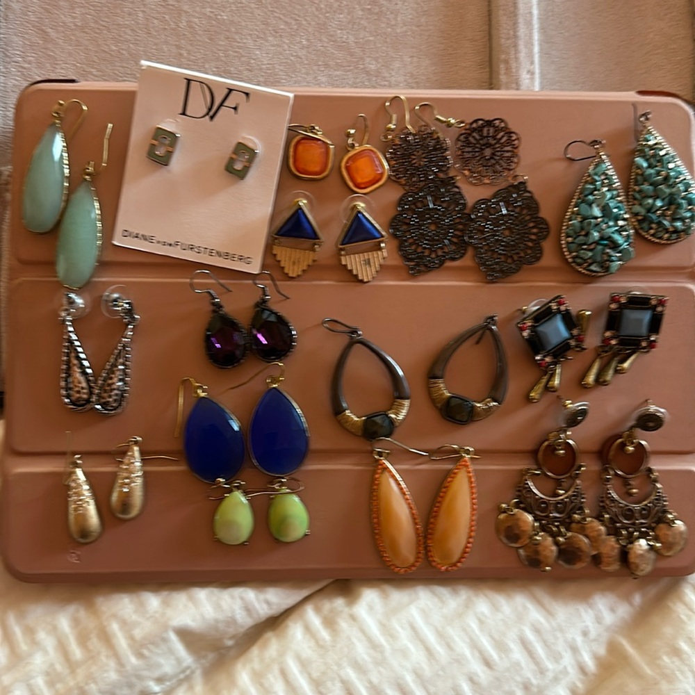 15 pairs of costume earrings.